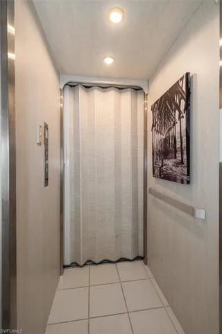 a view of a hallway with closet