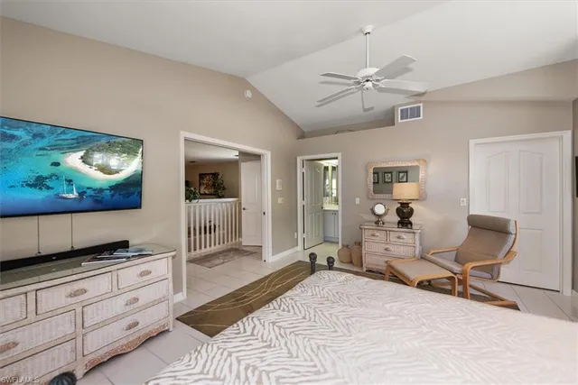 a room with a bed and furniture