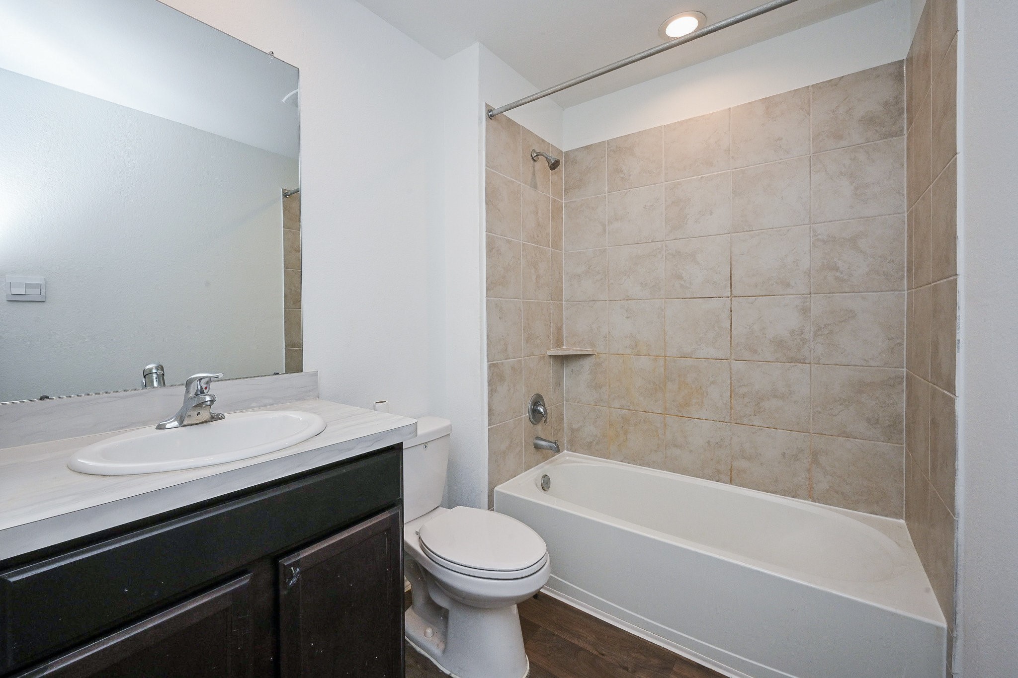 2342 Spruce Clf Lane Spring, TX 77373 - Photo 25 of 32 a bathroom with a sink a toilet and shower