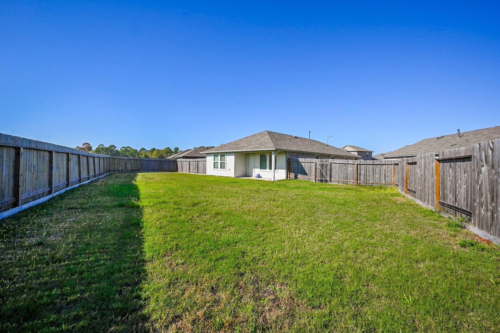 2342 Spruce Clf Lane Spring, TX 77373 - Photo 31 of 32 a view of a house with backyard and garden