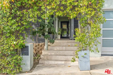 a view of house with outdoor space