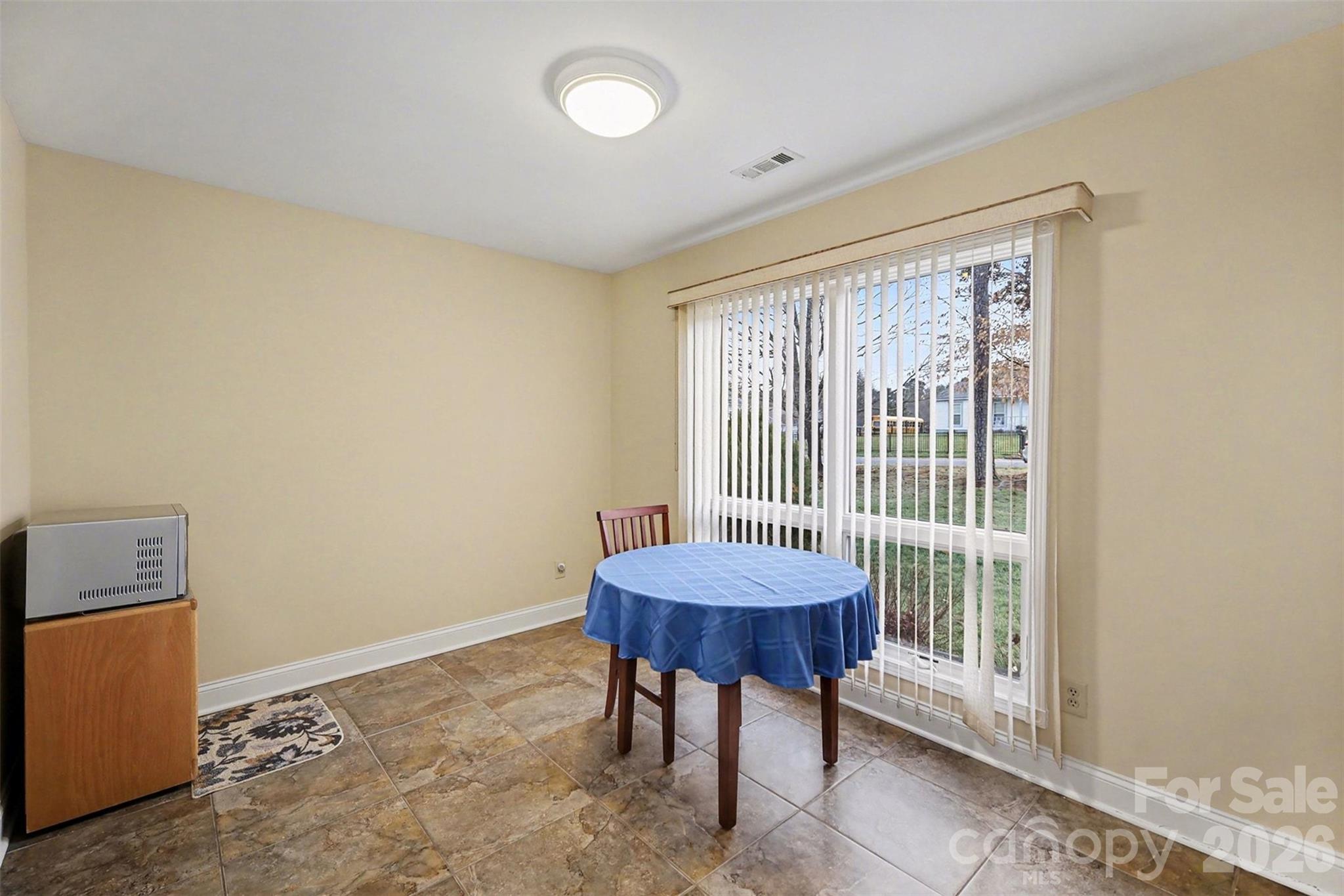 9325 Chislehurst Road Mint Hill, NC 28227 - Photo 16 of 30 a room with a table and chairs
