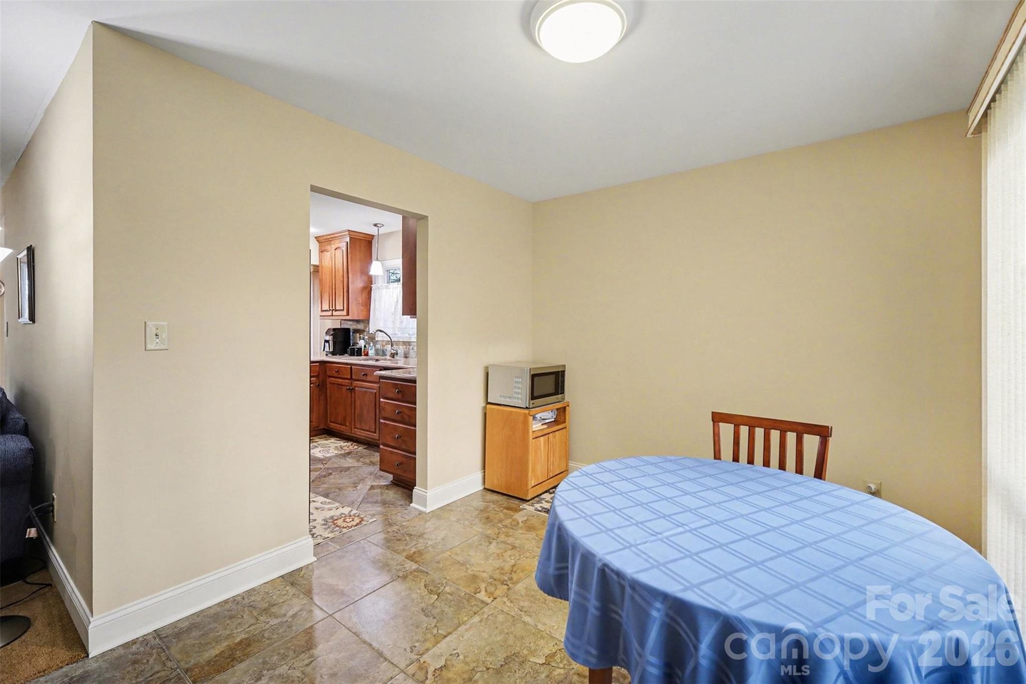 9325 Chislehurst Road Mint Hill, NC 28227 - Photo 2 of 30 a bedroom with a bed and wooden floor