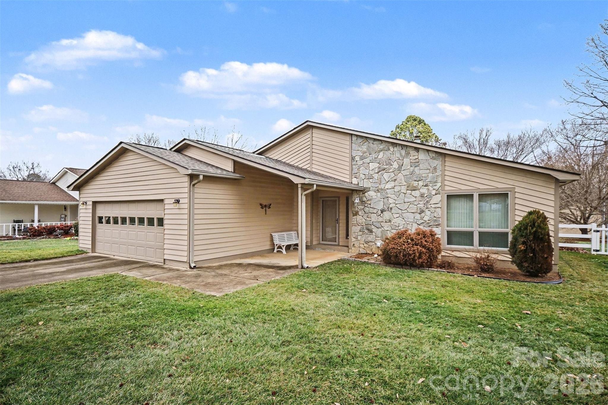 9325 Chislehurst Road Mint Hill, NC 28227 - Photo 25 of 30 a view of a house with a yard