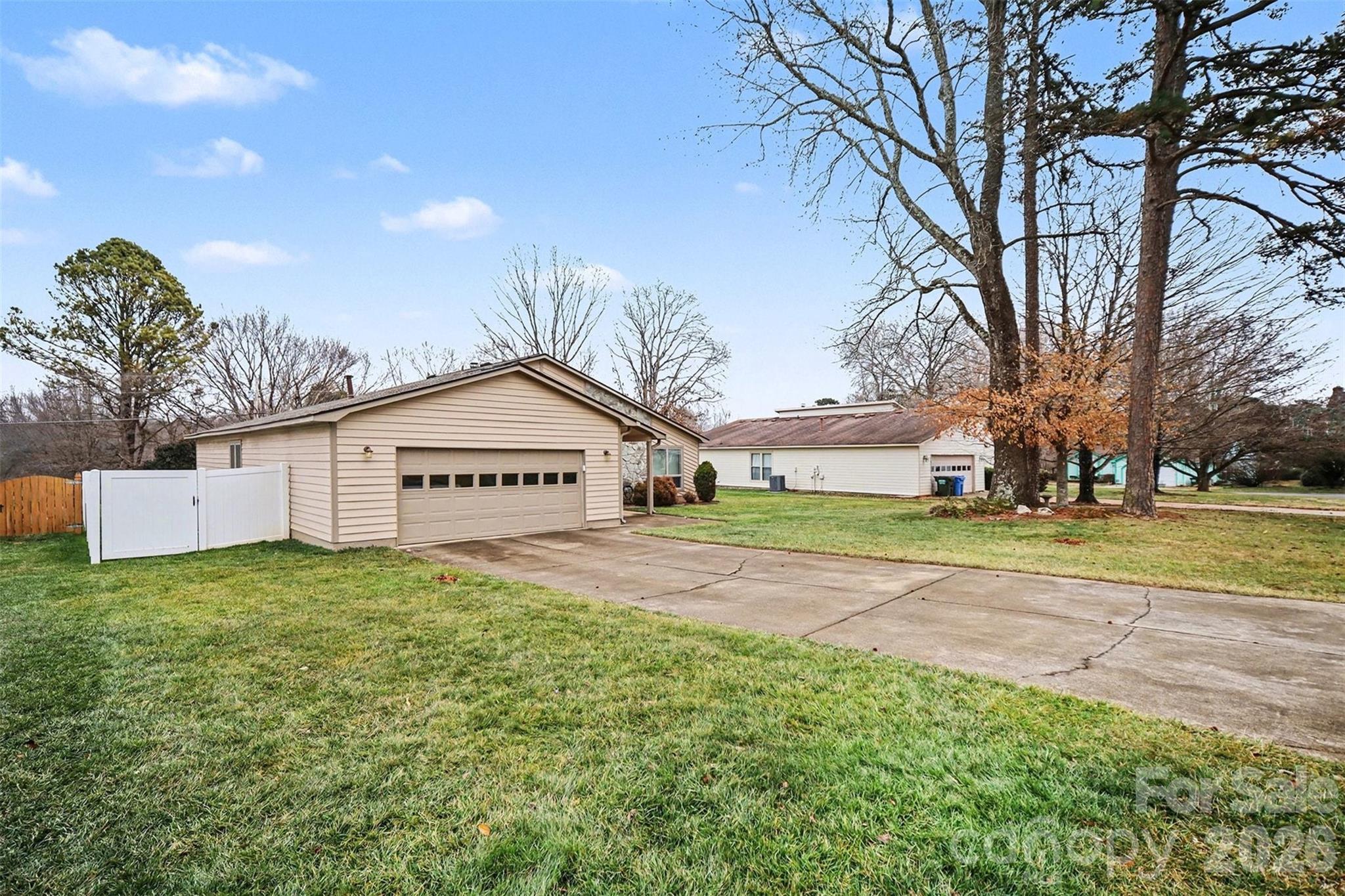 9325 Chislehurst Road Mint Hill, NC 28227 - Photo 29 of 30 a view of big house with a big yard and large trees