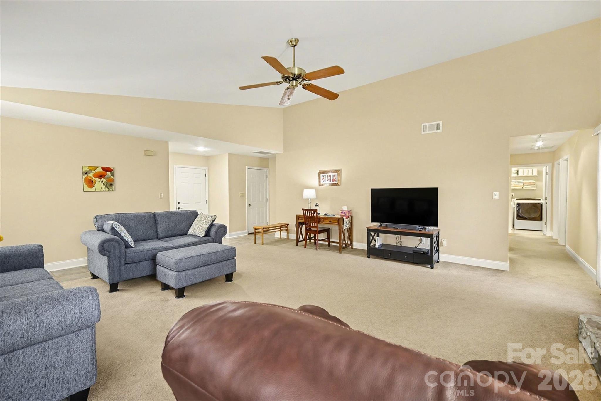 9325 Chislehurst Road Mint Hill, NC 28227 - Photo 3 of 30 a living room with furniture and a flat screen tv