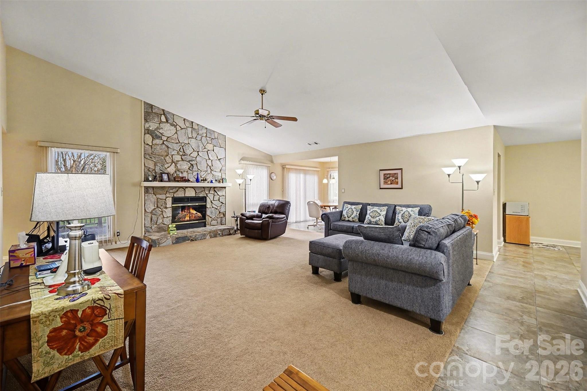 9325 Chislehurst Road Mint Hill, NC 28227 - Photo 4 of 30 a living room with furniture and a fireplace