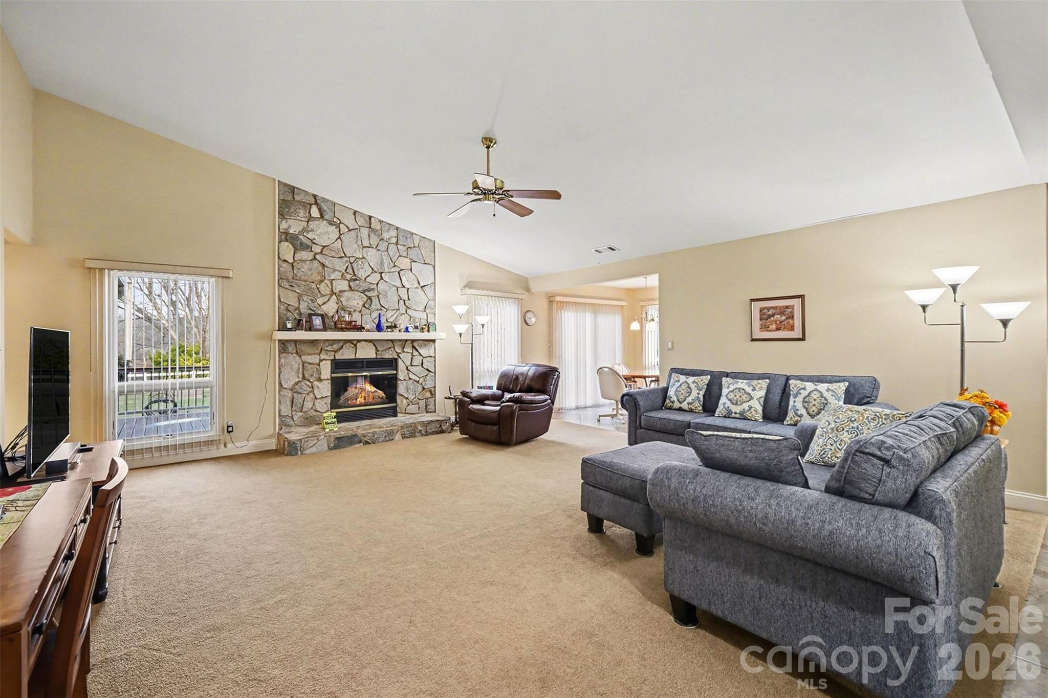 9325 Chislehurst Road Mint Hill, NC 28227 - Photo 5 of 30 a living room with furniture and a fireplace