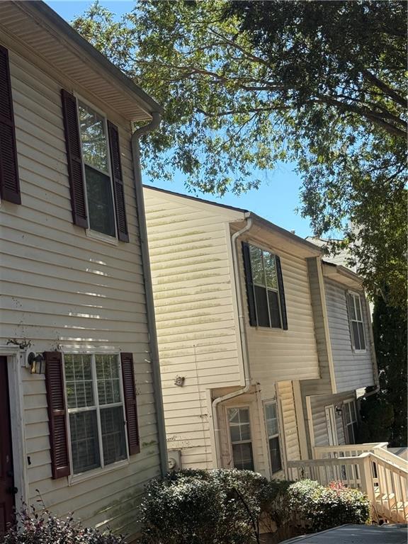 6341 Wedgeview Drive Tucker, GA 30084 - Photo 3 of 26 a view of a house with a tree