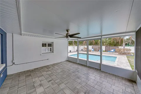 a view of a swimming pool with a patio