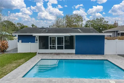 a view of outdoor space yard deck patio and swimming pool