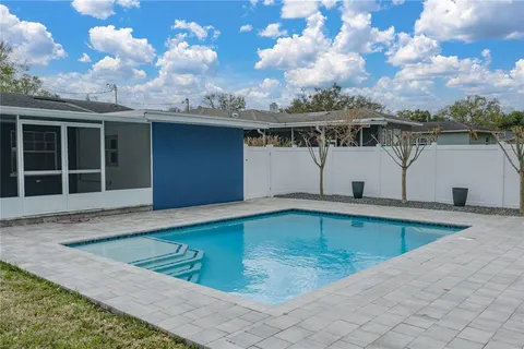 a backyard of a house with lots of green space