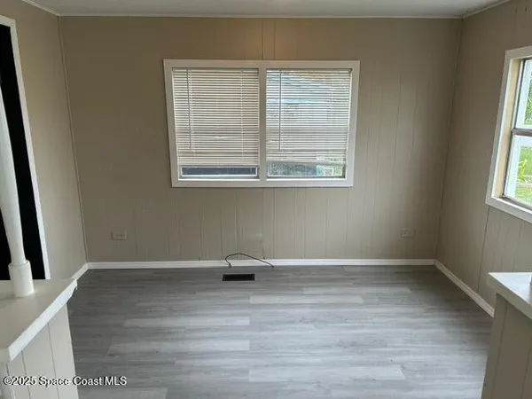 a view of a room with a window