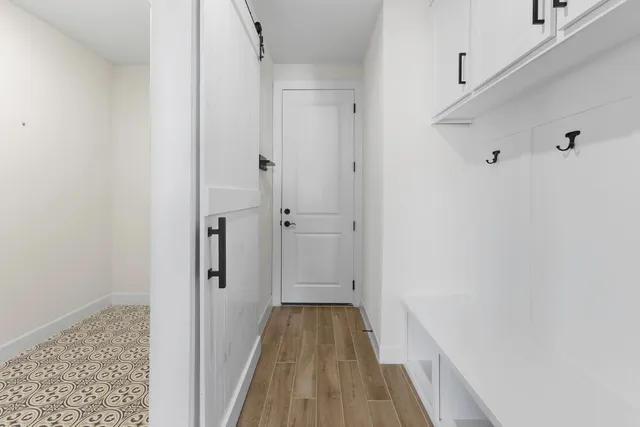 a view of a bathroom from a hallway