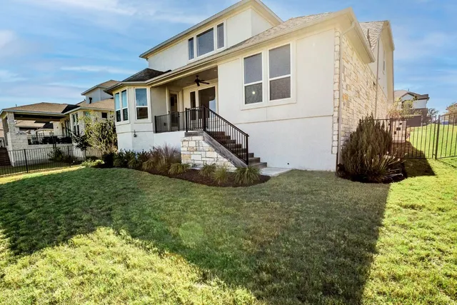 a house view with a garden space