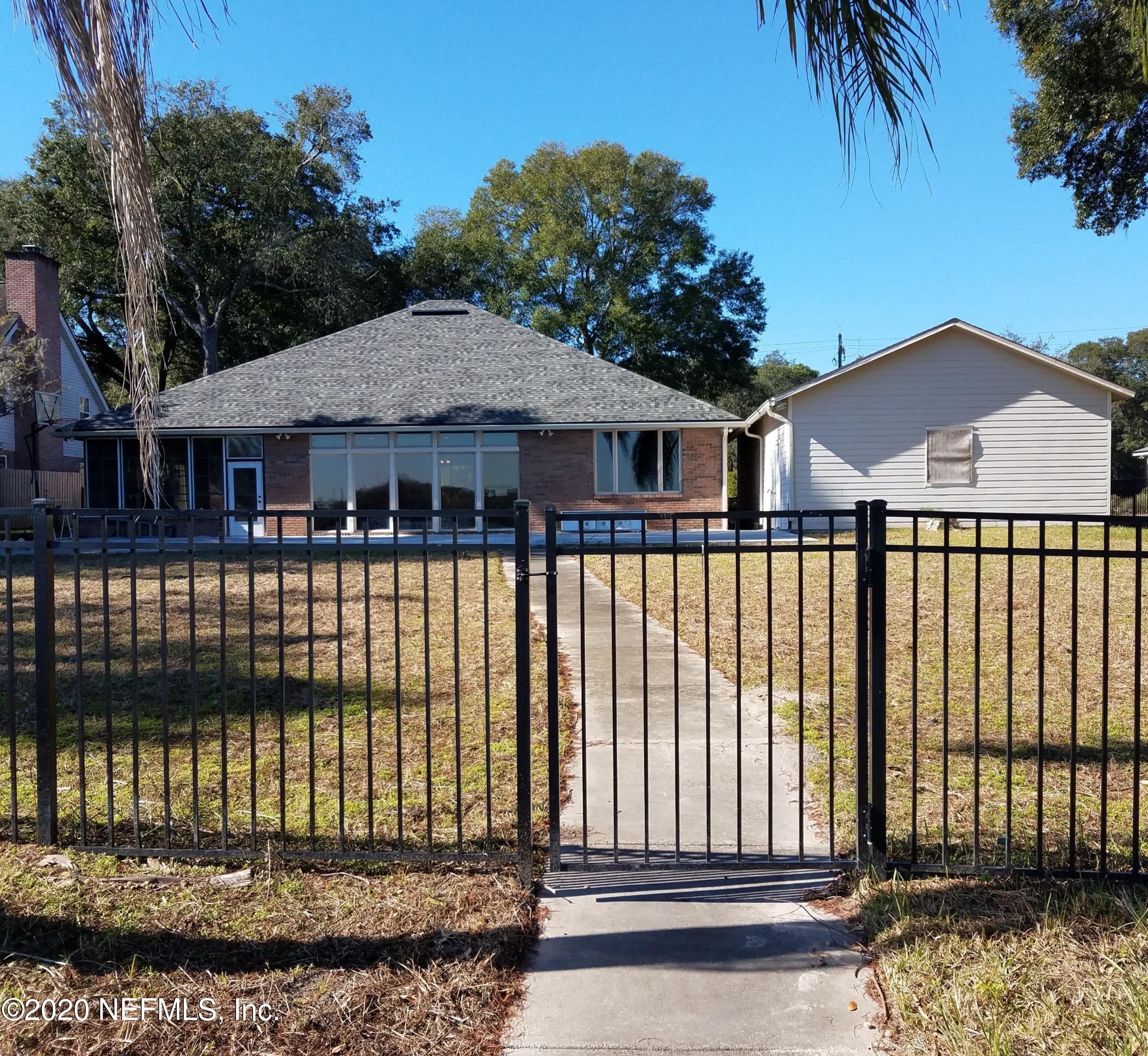 1501 Cedar Bay Road Jacksonville, FL 32218 - Photo 2 of 49 front view of a house with a balcony