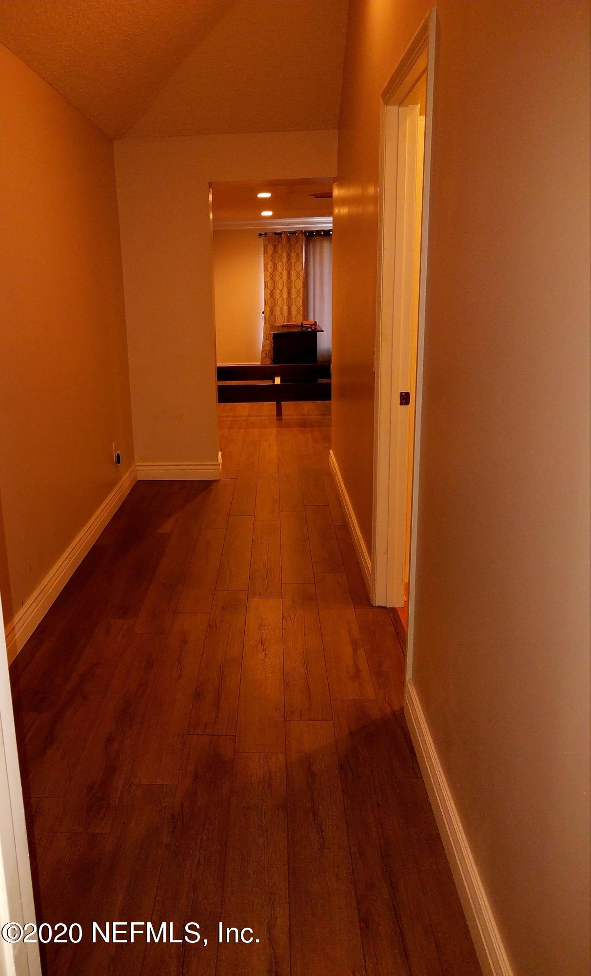 1501 Cedar Bay Road Jacksonville, FL 32218 - Photo 26 of 49 a view of hallway with wooden floor