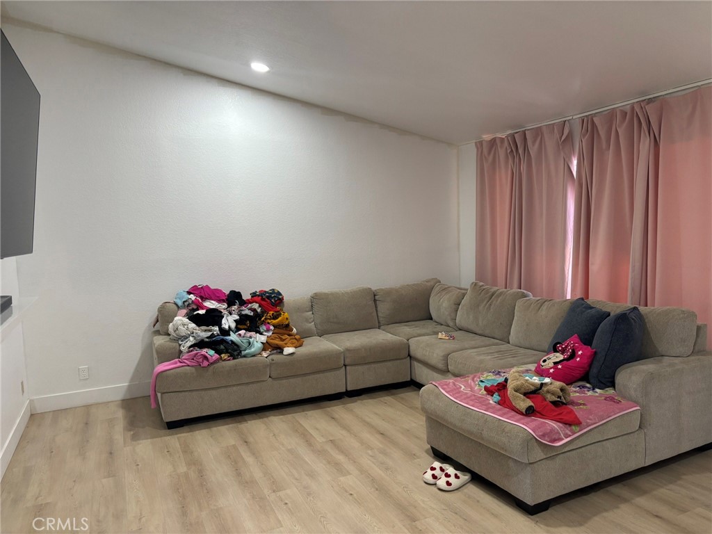 9591 Colfax Road Phelan, CA 92371 - Photo 20 of 24 a living room with furniture and a couch