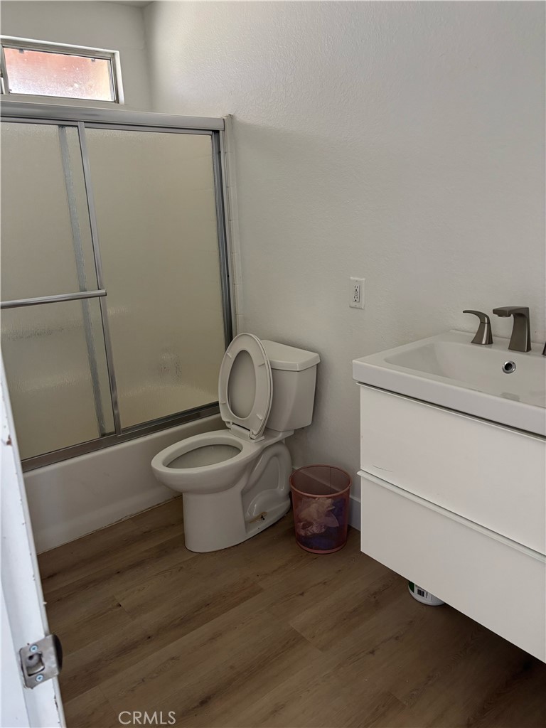 9591 Colfax Road Phelan, CA 92371 - Photo 10 of 24 a bathroom with a toilet and a sink