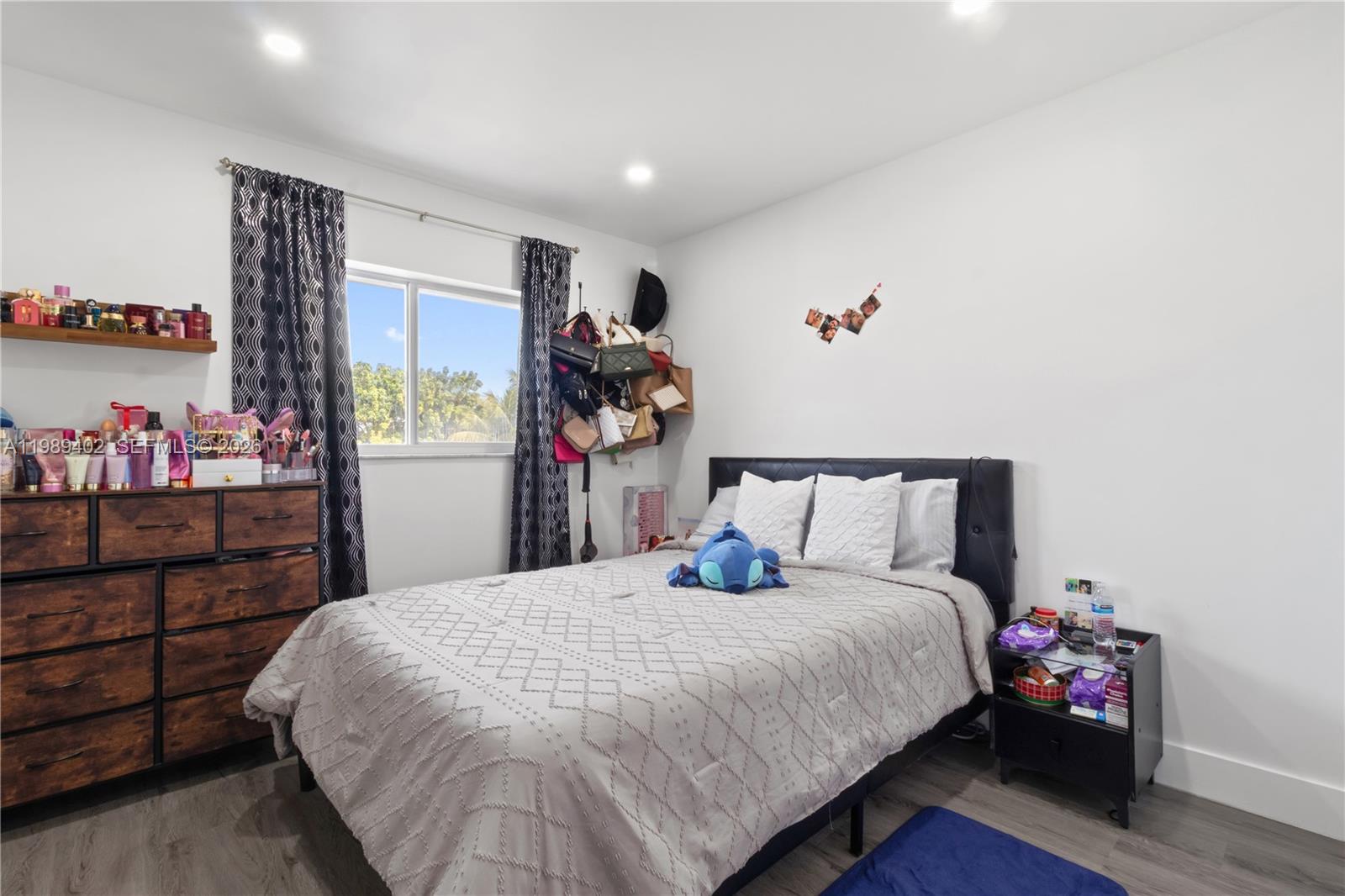 14052 Southwest 167th Terrace Miami, FL 33177 - Photo 23 of 33 a bed room with a bed and a tv