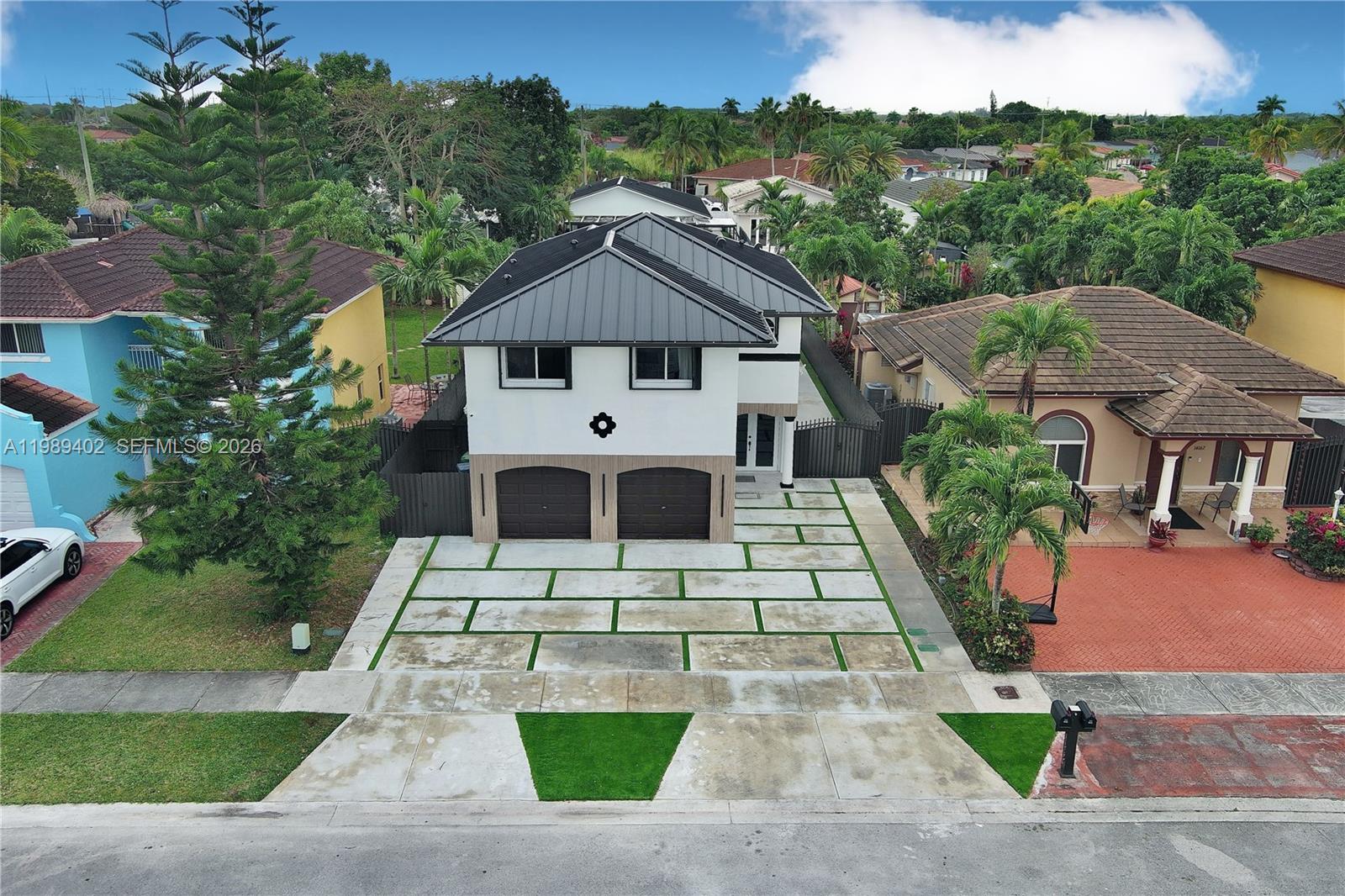 14052 Southwest 167th Terrace Miami, FL 33177 - Photo 27 of 33 an aerial view of a house with a yard