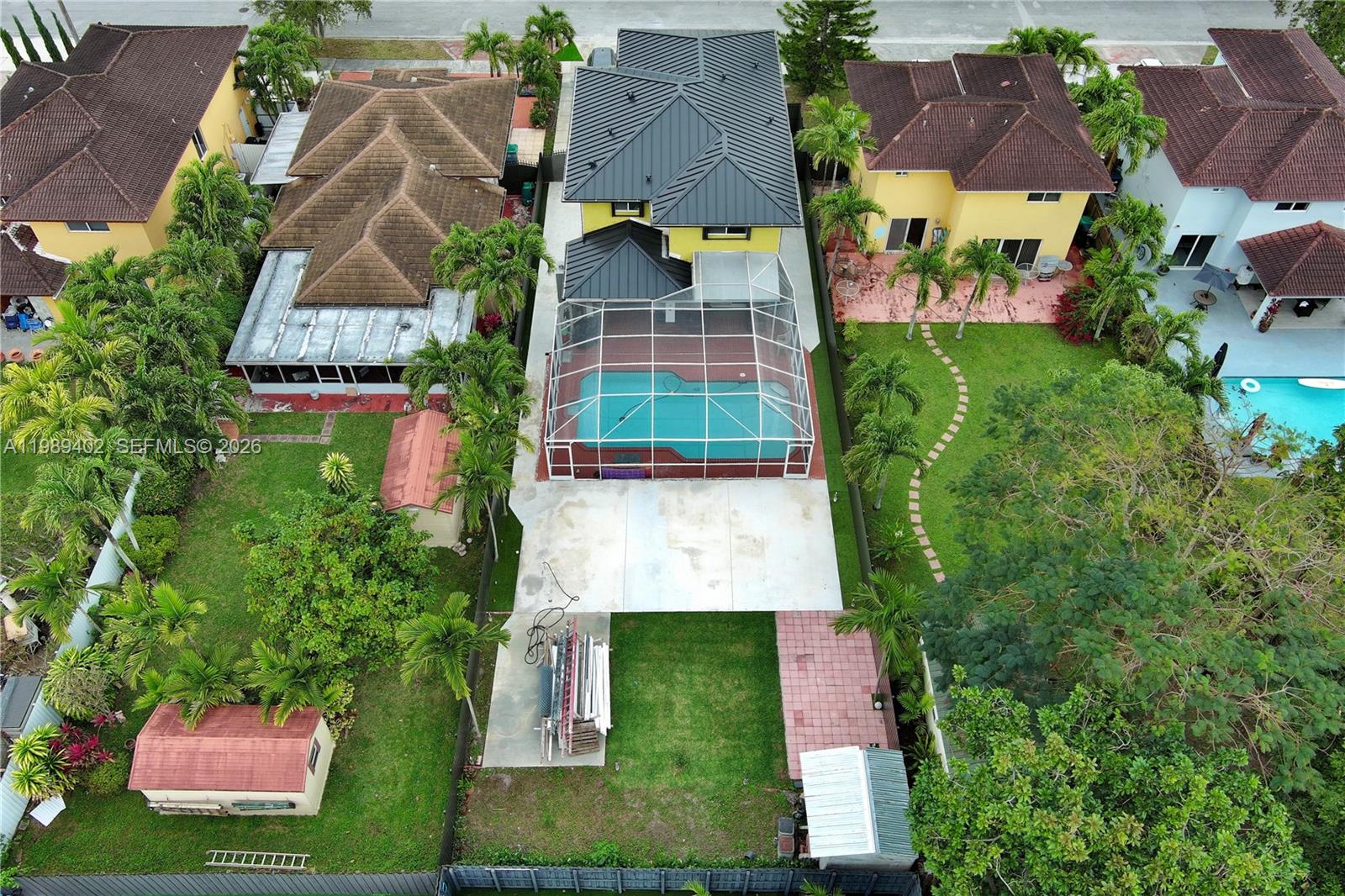 14052 Southwest 167th Terrace Miami, FL 33177 - Photo 29 of 33 an aerial view of a house