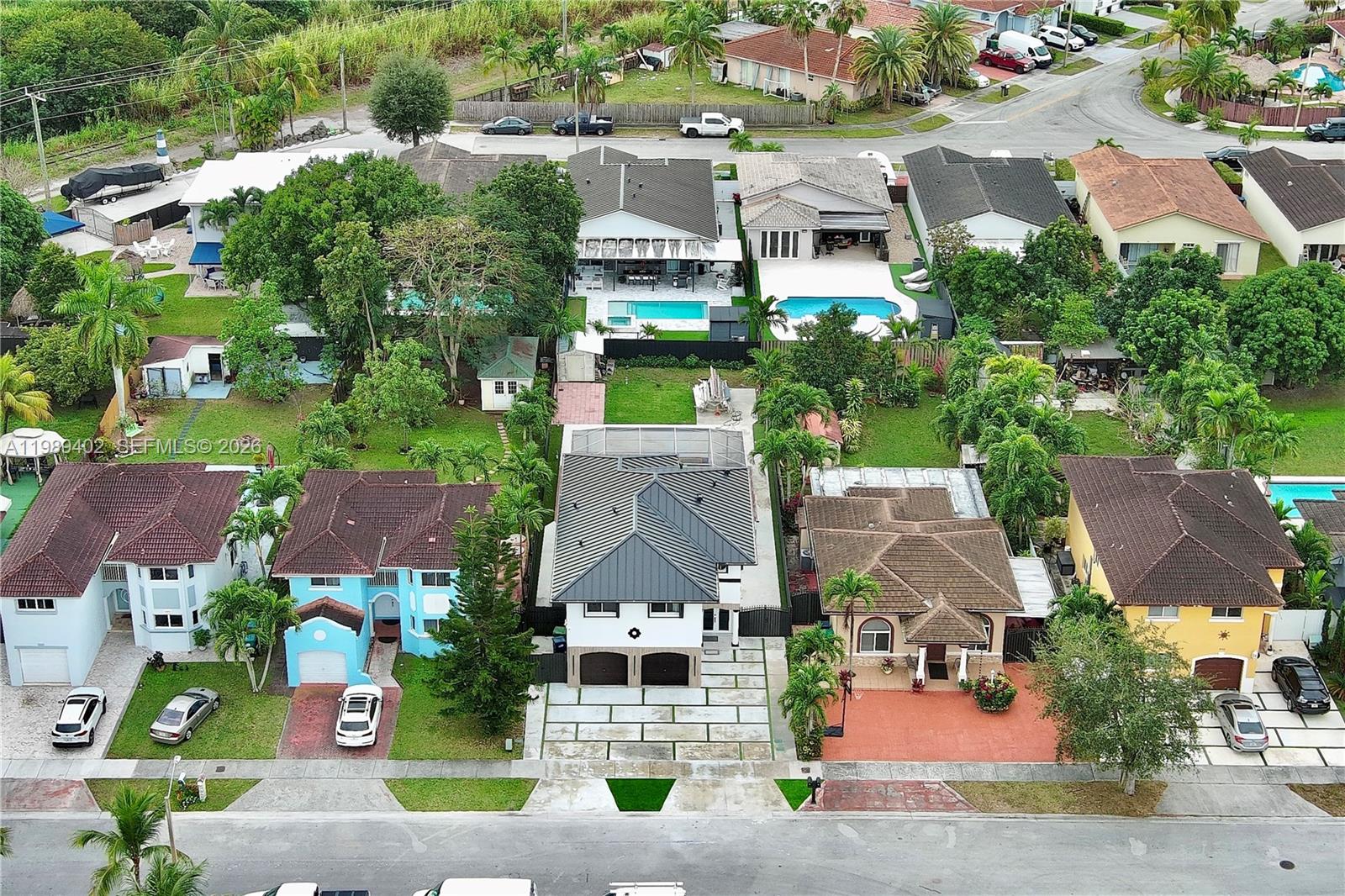 14052 Southwest 167th Terrace Miami, FL 33177 - Photo 32 of 33 an aerial view of multiple houses