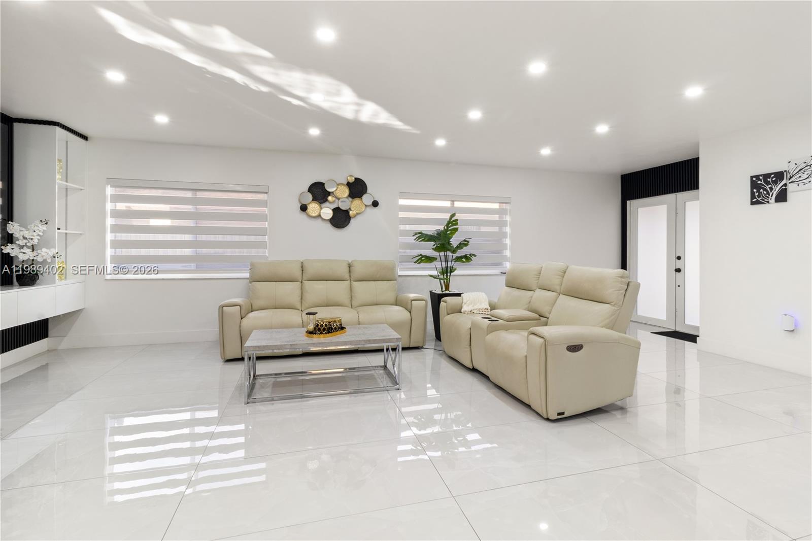 14052 Southwest 167th Terrace Miami, FL 33177 - Photo 7 of 33 a living room with furniture
