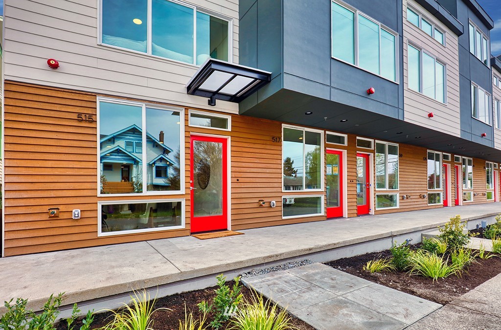515 Northwest 70th Street Seattle, WA 98117 - Photo 2 of 32 a front view of a building with porch