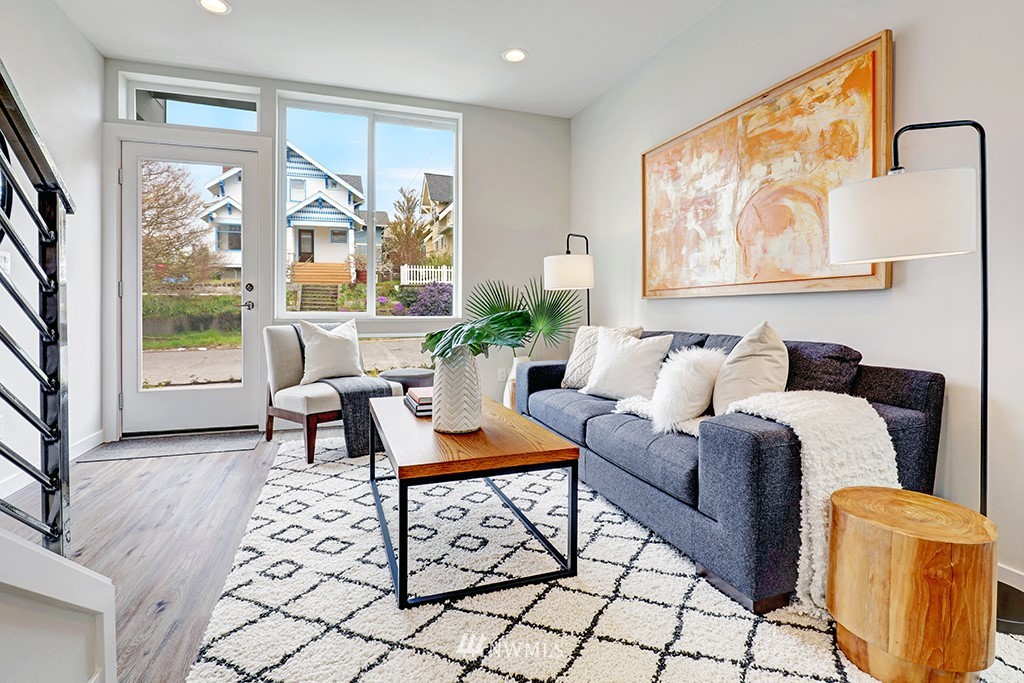 515 Northwest 70th Street Seattle, WA 98117 - Photo 11 of 32 a living room with furniture and a large window