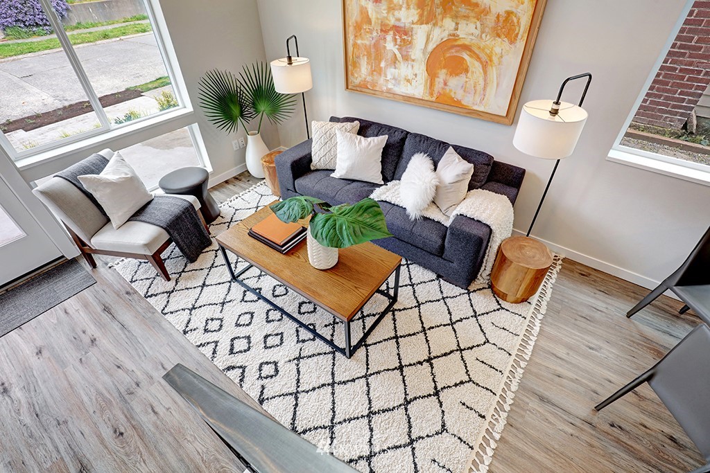 515 Northwest 70th Street Seattle, WA 98117 - Photo 14 of 32 a living room with furniture and wooden floor