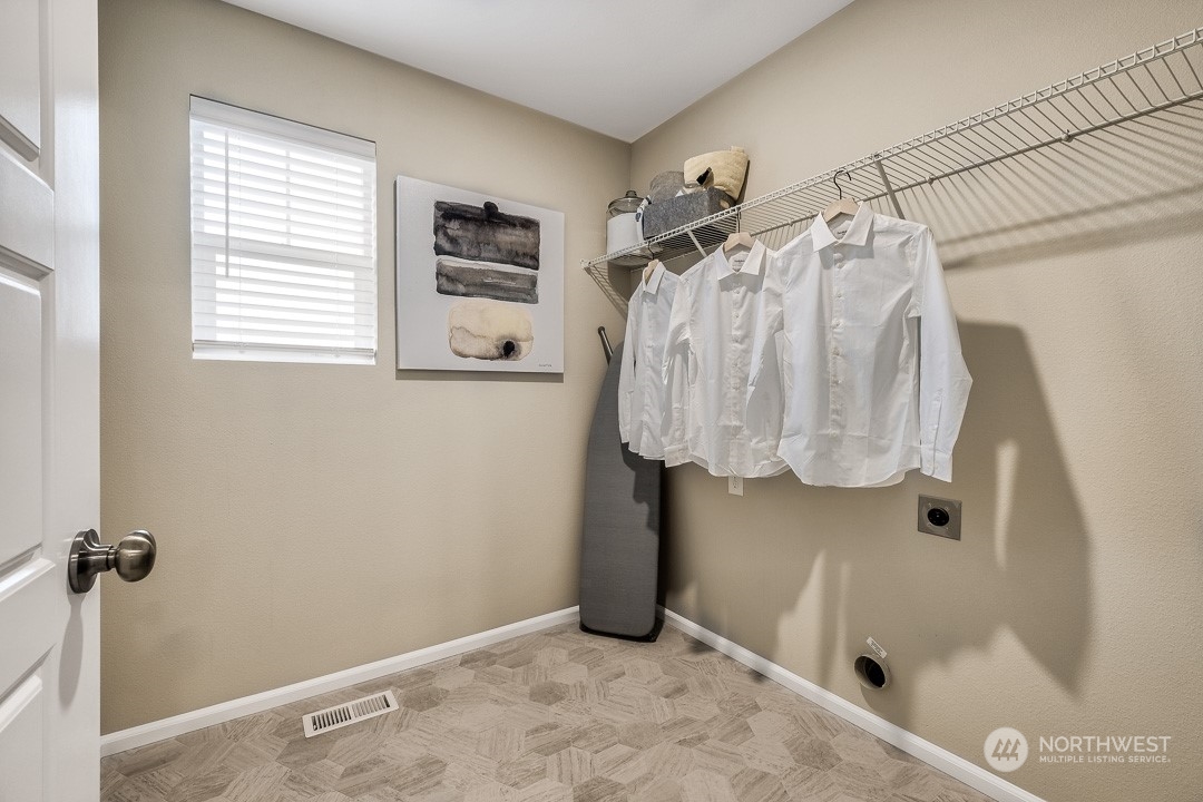 1606 12th Place, Unit 1161 Sultan, WA 98294 - Photo 14 of 20 a bathroom with a shower and a tub