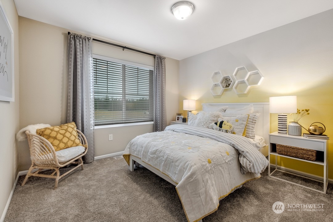 1606 12th Place, Unit 1161 Sultan, WA 98294 - Photo 15 of 20 a bedroom with a bed chair and window