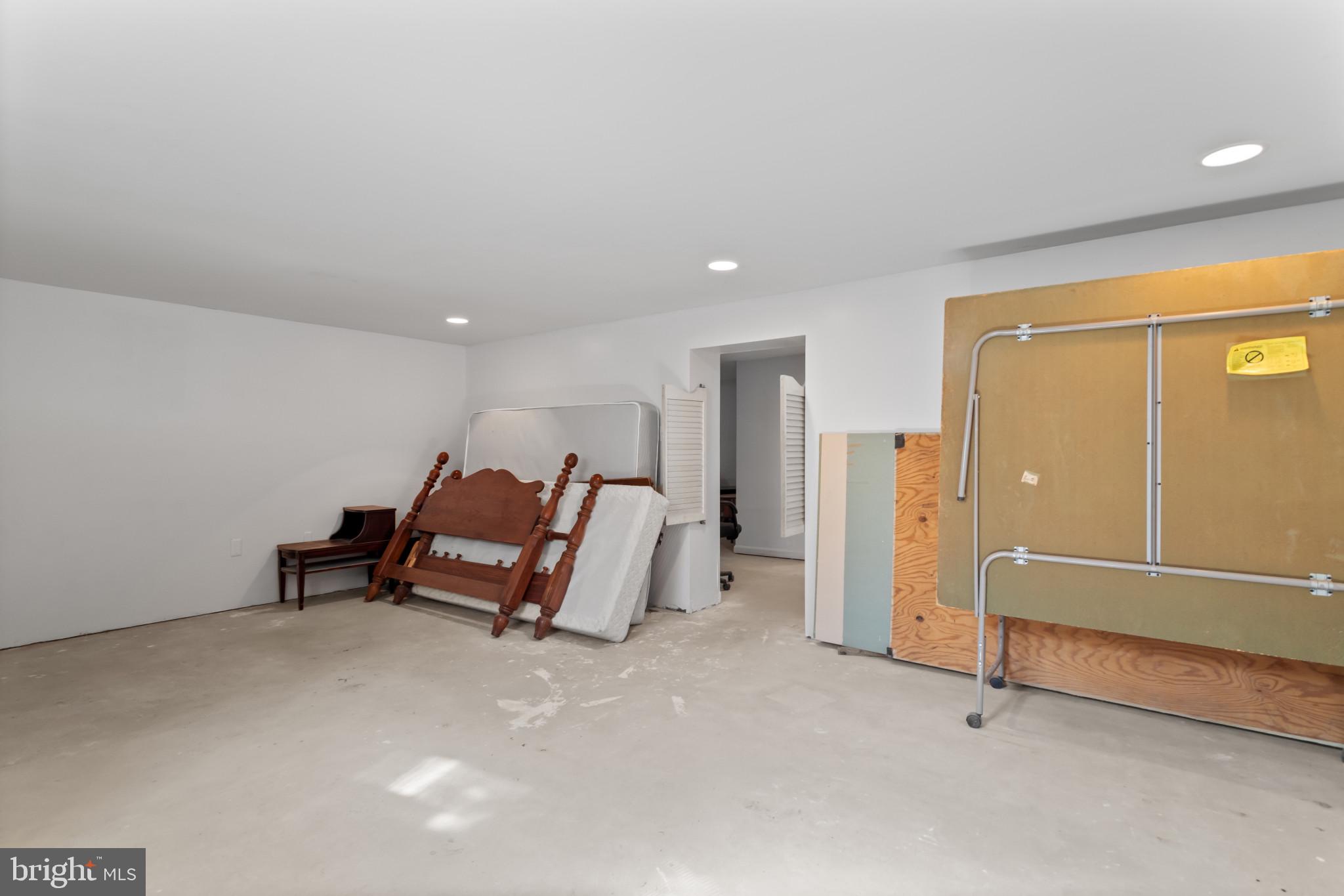 18 Hahn Road Westminster, MD 21157 - Photo 12 of 22 an empty room with wooden floor and windows