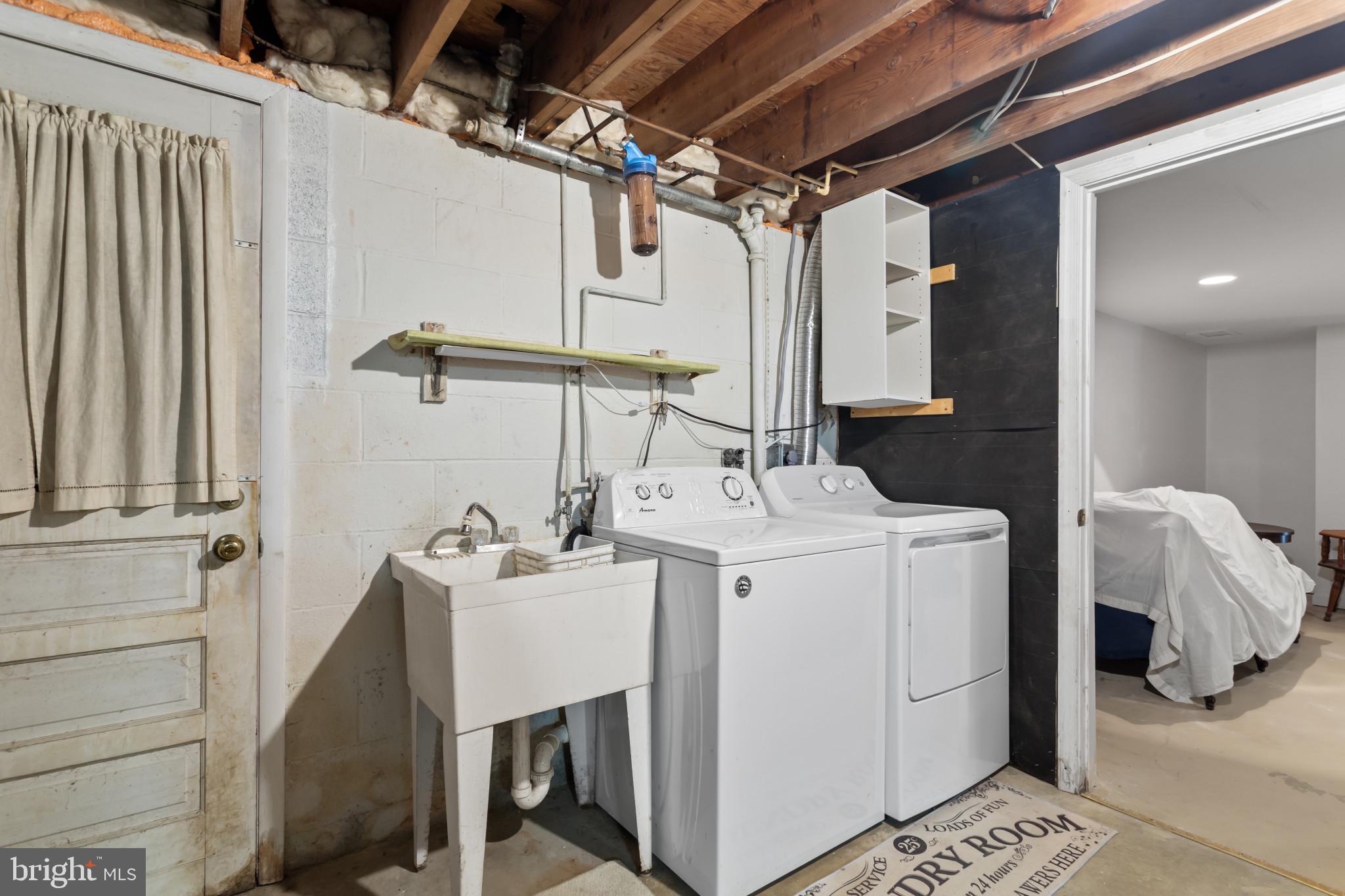 18 Hahn Road Westminster, MD 21157 - Photo 16 of 22 a utility room with dryer and washer