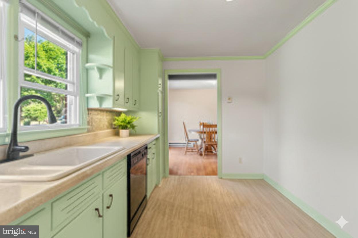 18 Hahn Road Westminster, MD 21157 - Photo 4 of 22 a kitchen with a sink and a refrigerator