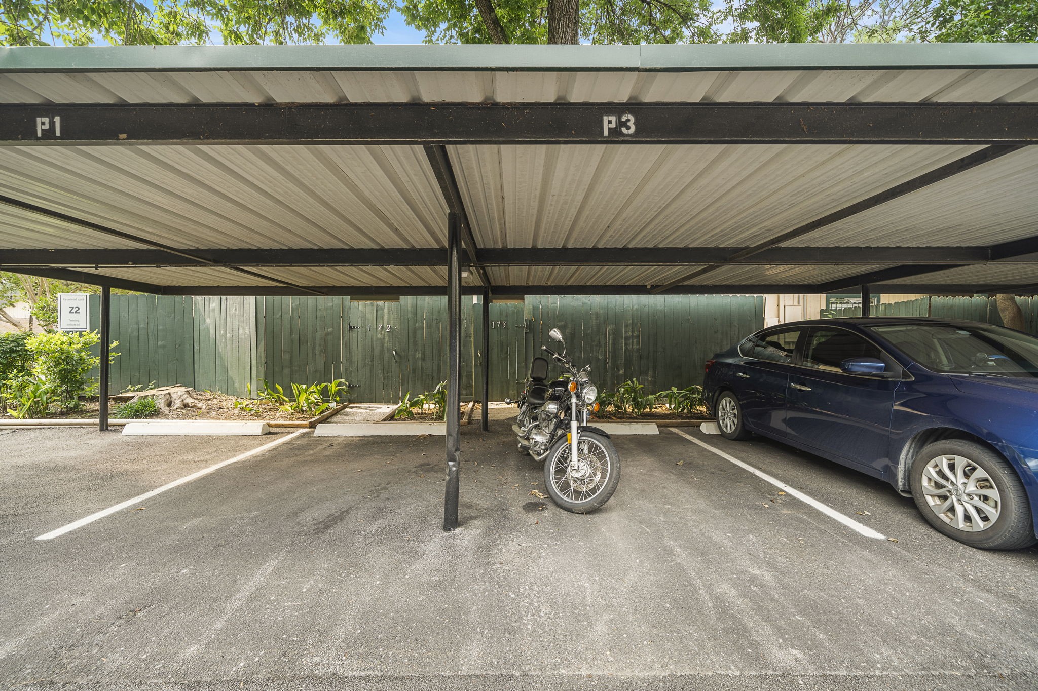 8289 Kingsbrook Road, Unit 173 Houston, TX 77024 - Photo 19 of 20 Reserved parking space that comes with the unit.