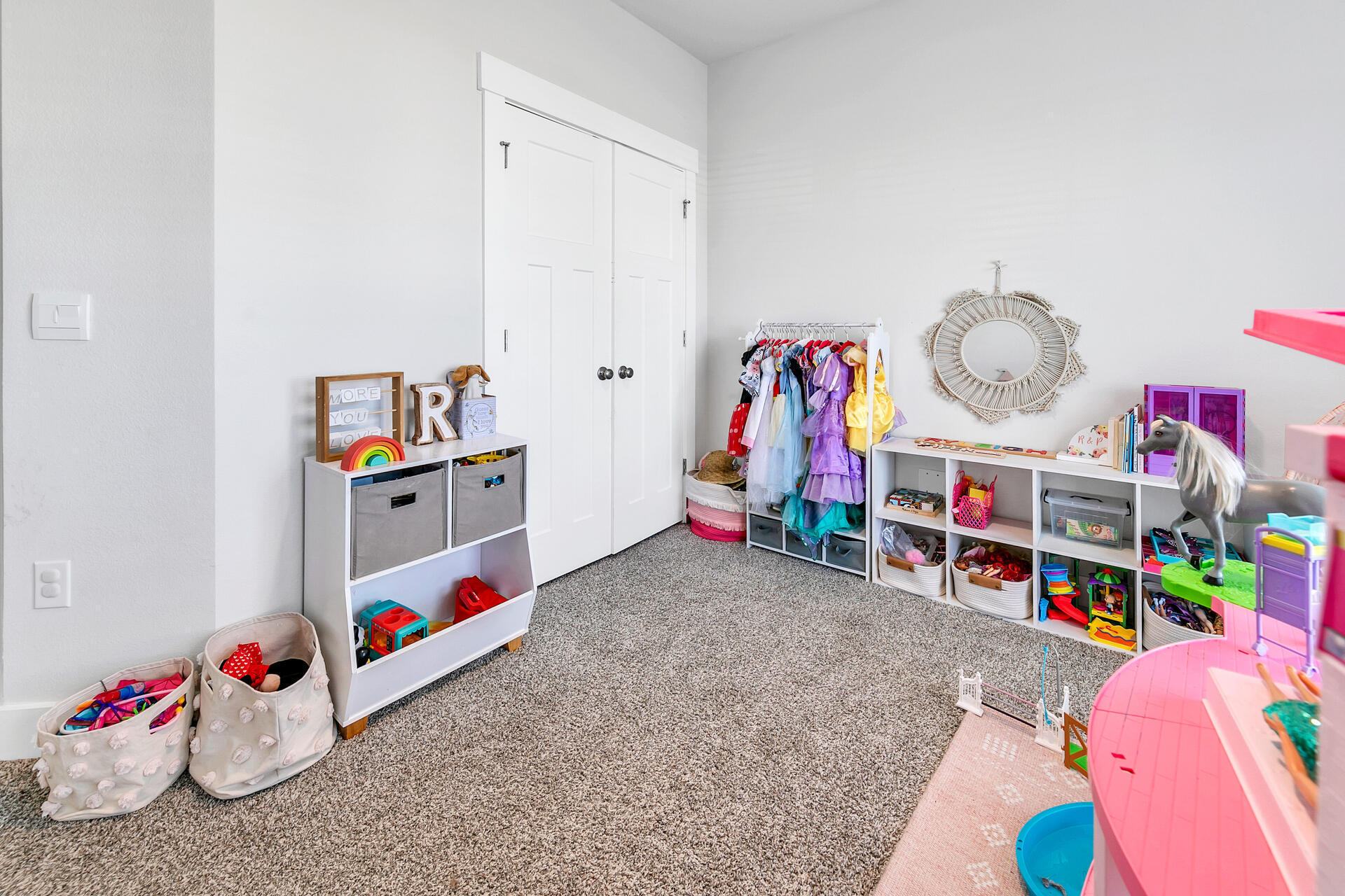 720 Quintana Street Crestview, FL 32539 - Photo 13 of 26 a room with toys and a couch