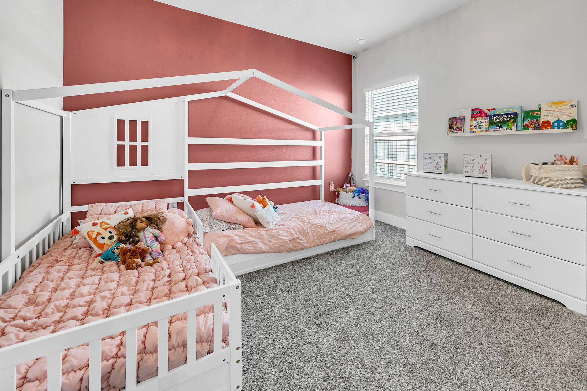 720 Quintana Street Crestview, FL 32539 - Photo 14 of 26 a bedroom with bed and a window