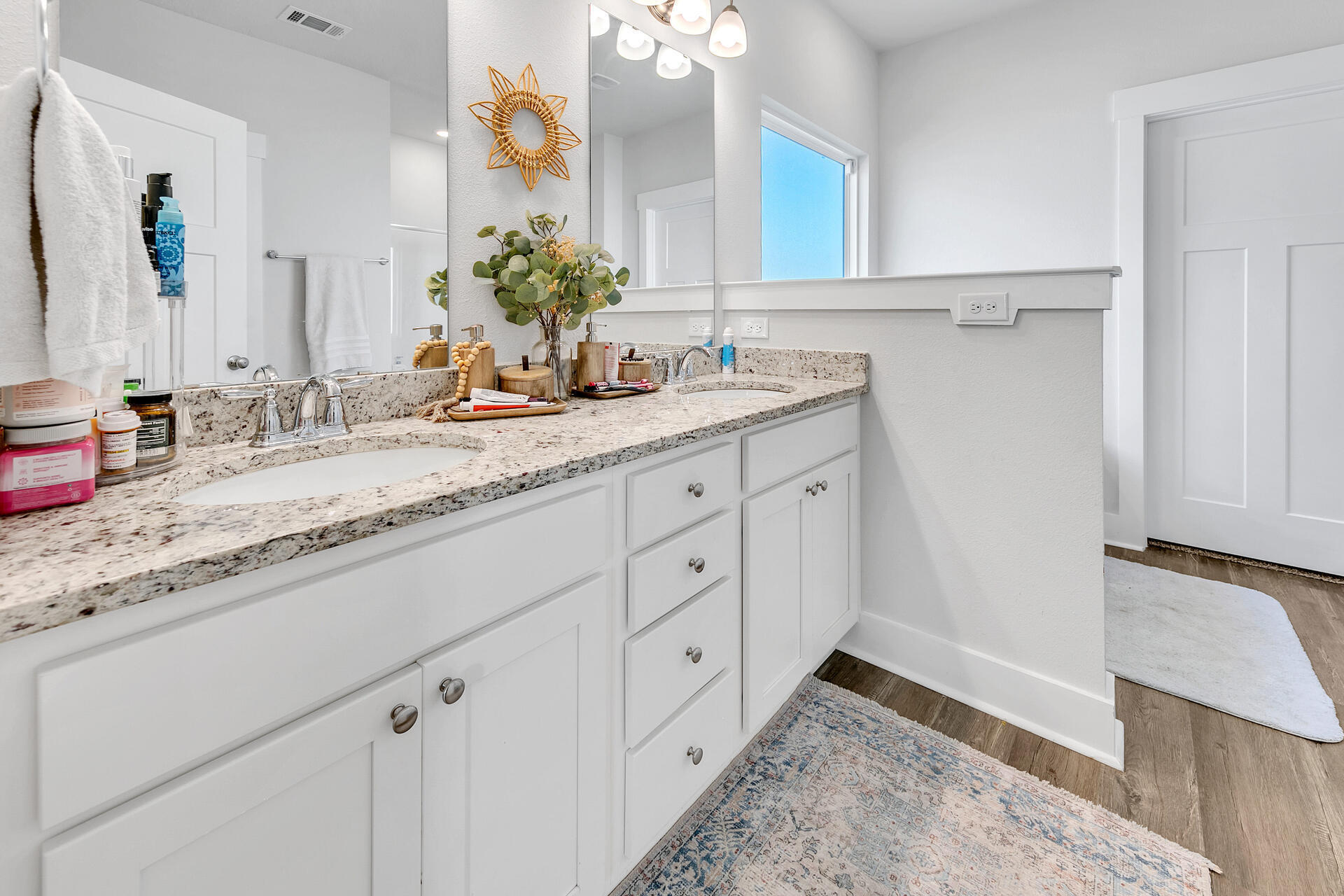 720 Quintana Street Crestview, FL 32539 - Photo 17 of 26 a bathroom with a sink and a mirror