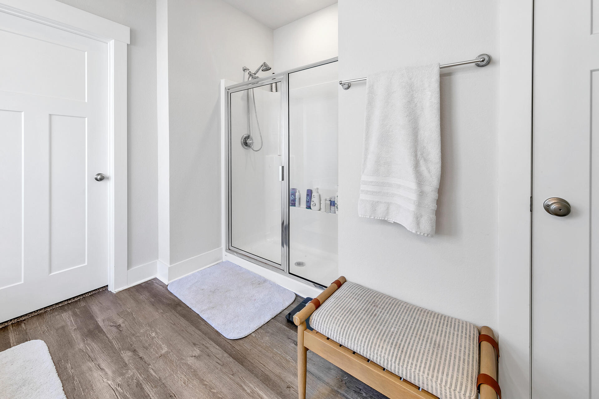 720 Quintana Street Crestview, FL 32539 - Photo 18 of 26 a view of a hallway with front door and wooden floor