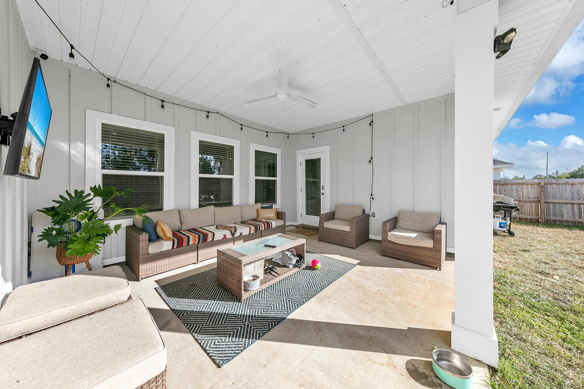720 Quintana Street Crestview, FL 32539 - Photo 20 of 26 a living room with furniture and a large window