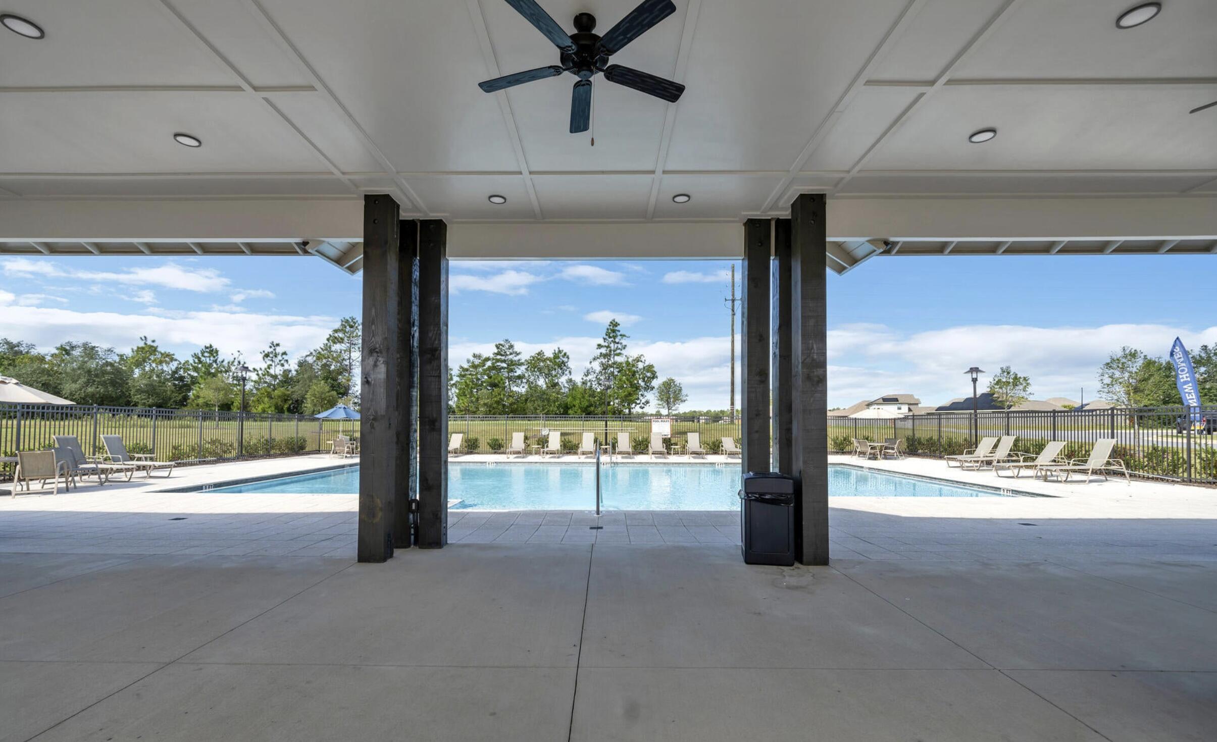 720 Quintana Street Crestview, FL 32539 - Photo 25 of 26 a view of a room with a floor to ceiling window