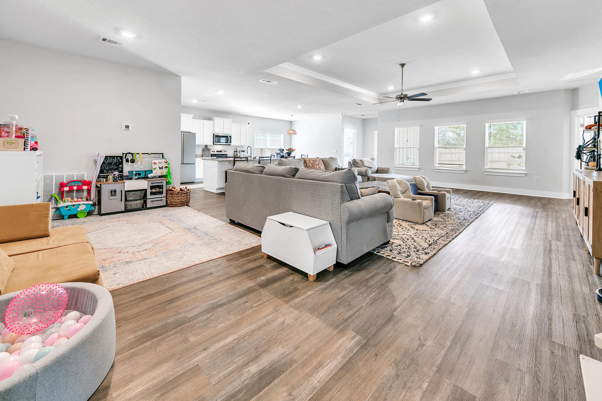 720 Quintana Street Crestview, FL 32539 - Photo 5 of 26 a living room with furniture and kitchen view