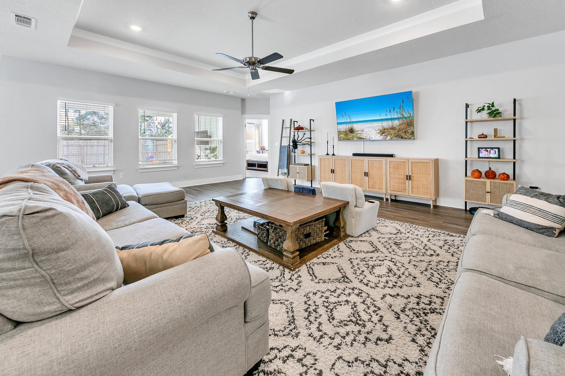 720 Quintana Street Crestview, FL 32539 - Photo 8 of 26 a living room with furniture and a flat screen tv
