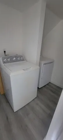 a view of a utility room with washer and dryer