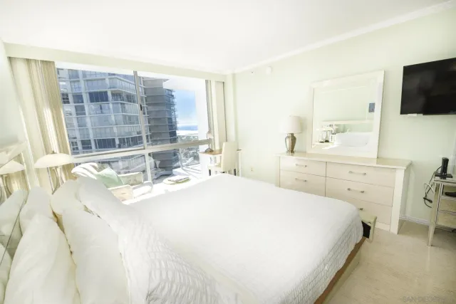 a view of a living room and dining room