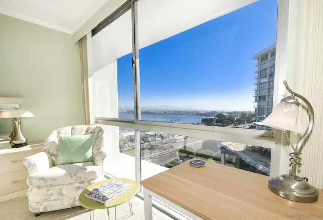a bathroom with a sink vanity and mirror