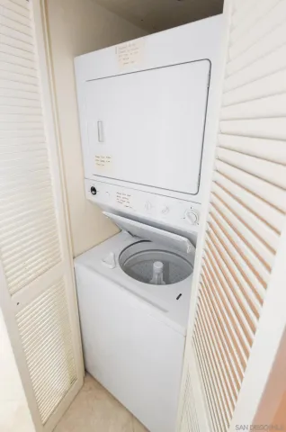a bathroom with a double vanity sink and a toilet