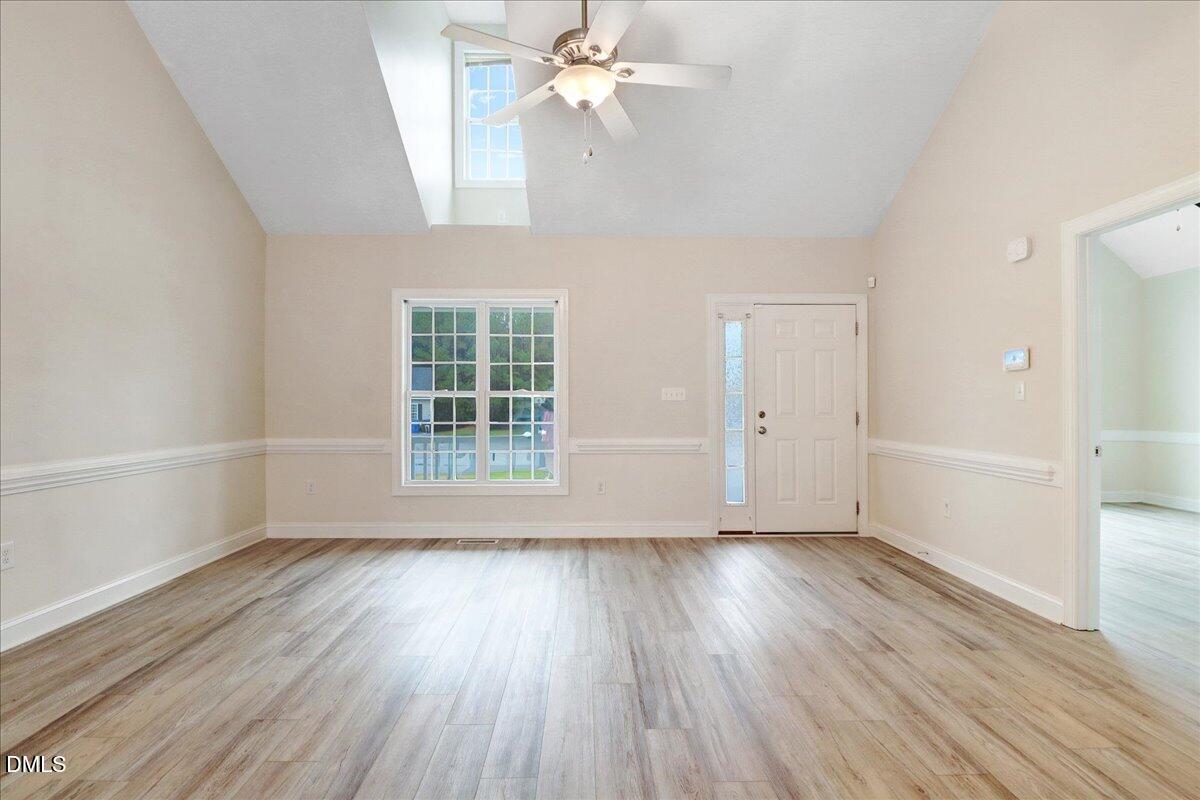 4416 Sunflower Court Wilson, NC 27896 - Photo 15 of 39 wooden floor in an empty room with a window